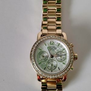 Coach women gold watch